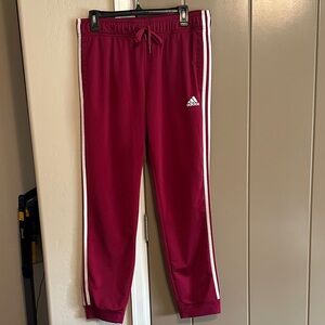Adidas Women's Maroon Joggers with White Stripes